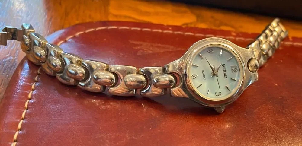 Women's Silver Tone Scketches Watch. Light Blue Face